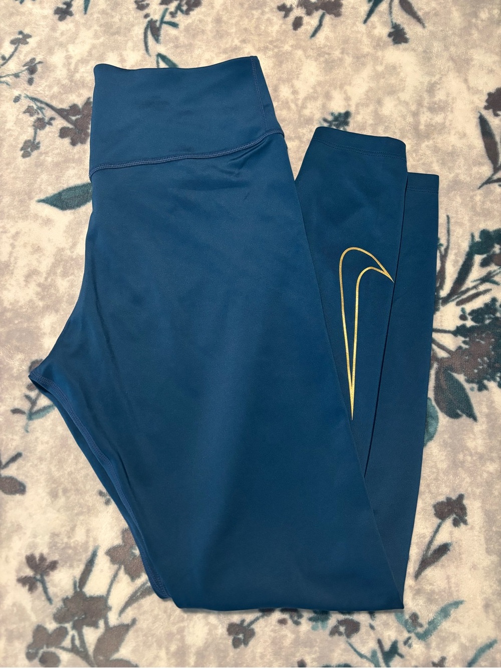 Nike Women’s Blue Leggings with Gold Swoosh